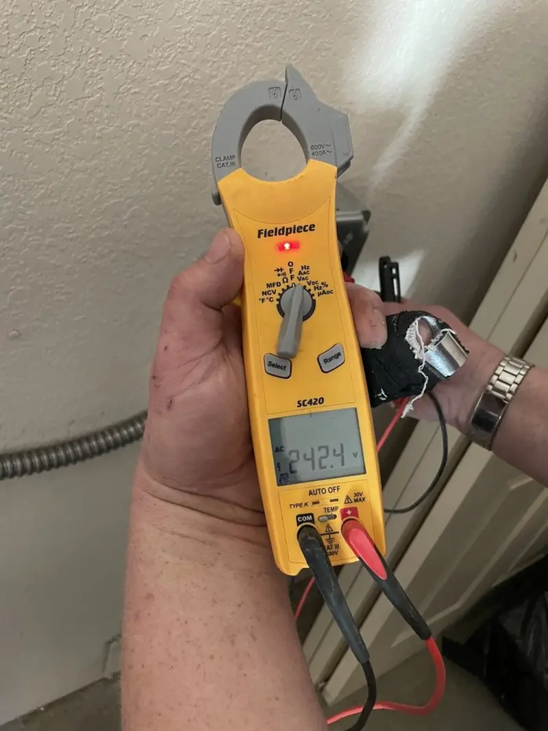 Voltage testing with clamp meter during Electrical Installation Services in Berkley